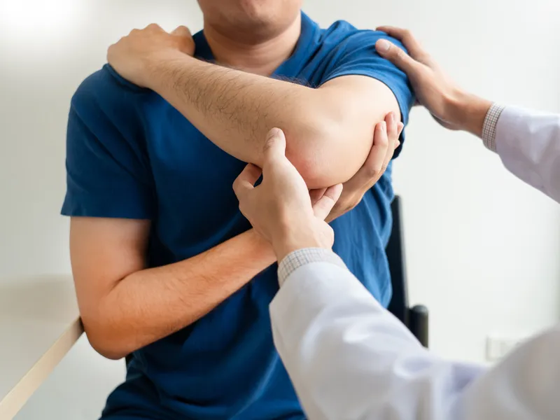 Bluebonnet Chiropractic treating arm pain in Tomball